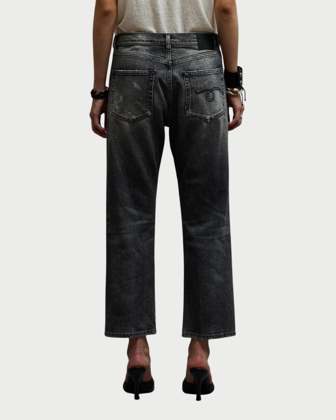 Back view of R13 Boyfriend Jean Vintage Grey in a relaxed, cropped fit with an embroidered swirl design on the right back pocket.