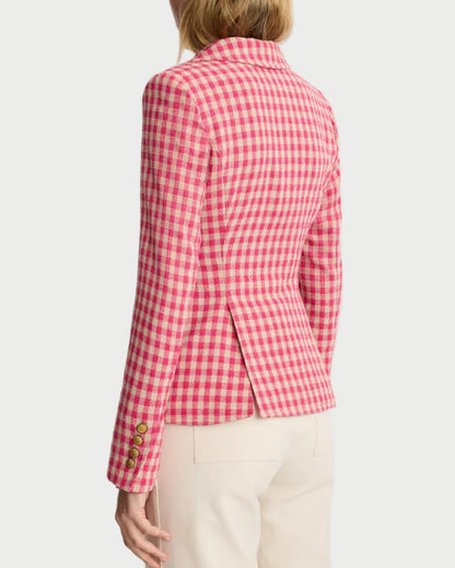 Person wearing a red and white checkered blazer on a light gray background