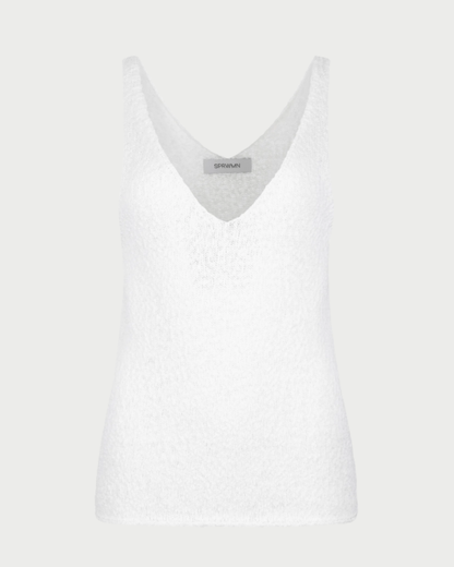 The SPRWMN Camille Top is a white sleeveless cotton bouclé tank with a deep V-neckline, shown on a light gray background. Its textured fabric and neckline label add style, making it a versatile essential by SPRWMN.