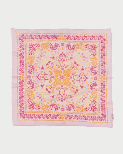 The Maison Lecomte Flament Noirmoutier Bandana Scarf is a chic square accessory with ornate floral and paisley prints in pink, yellow, and orange on a light background, finished with pink edges—a French-inspired piece from Maison Lecomte Flament.
