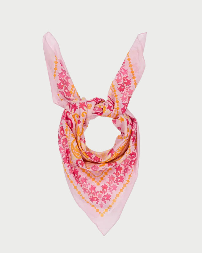 Pink floral patterned scarf on a white background
