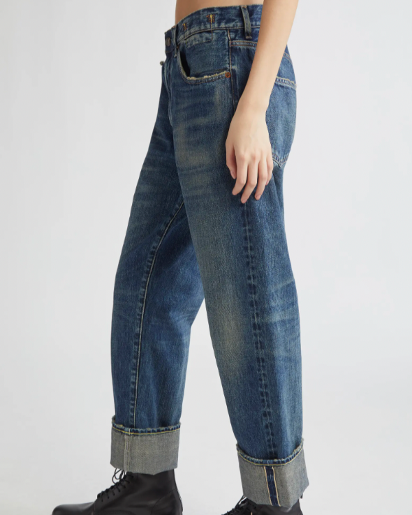 Model wears R13 Cuffed X-BF Jean with a cuffed hem and black boots, shown from the waist down against a plain white background.