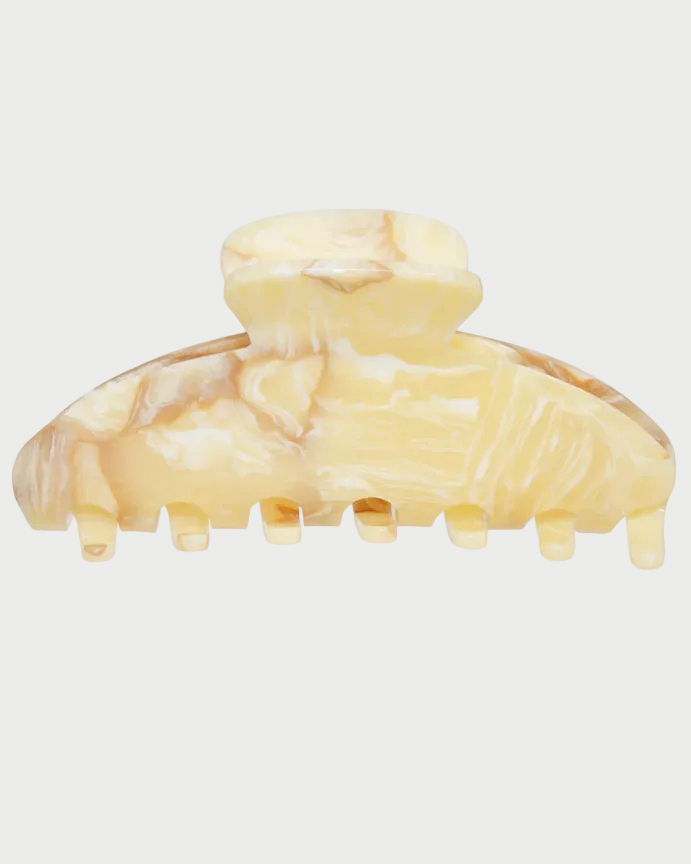 Marble-patterned hair clip on a white background with 'Award Winner' text.