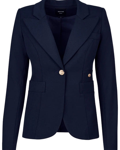 The Smythe Full Back Duchess Blazer is a navy blue tailored jacket with notch lapels, a single gold button closure, and two front flap pockets, shown against a white background.