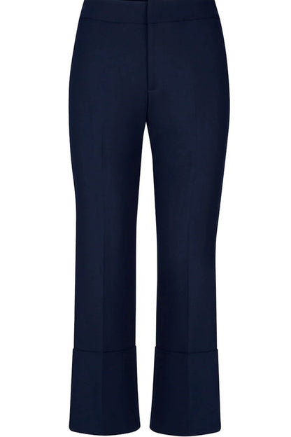 Smythe's Cuffed Flood Pant in Deep Navy features tailored mid-rise cropped trousers with wide, flood pant-inspired cuffs, shown against a plain white background.