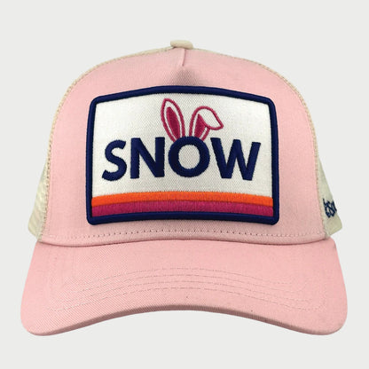 Pink cap with a 'SNOW' patch on a white background