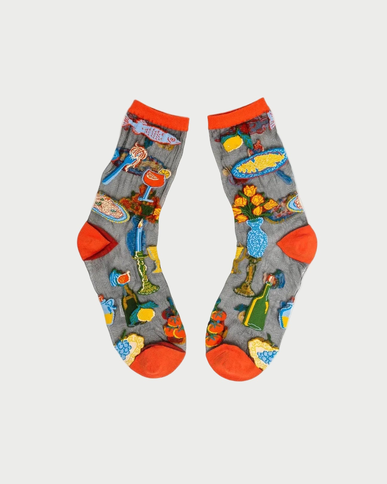 Pair of socks with colorful designs on a white background