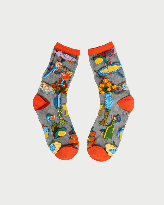 Pair of socks with colorful designs on a white background