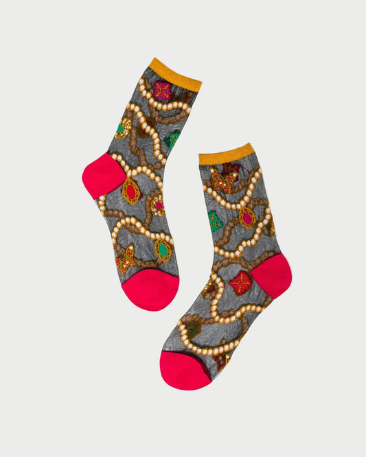 Colorful socks with decorative patterns on a white background