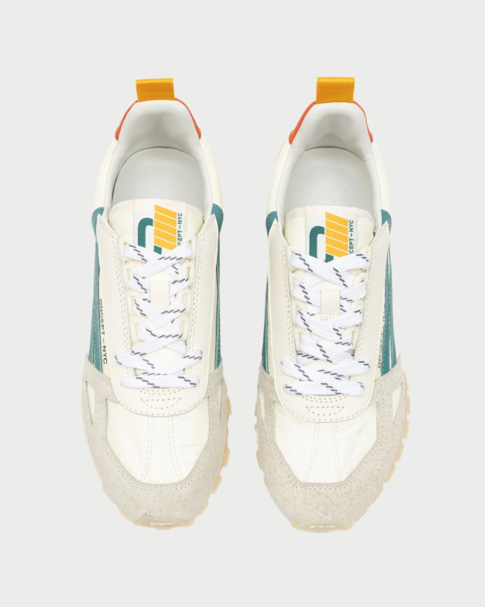Top view of Oncept's Toronto Sneaker, a stylish white design with teal and orange details. It showcases a textured suede toe, sustainable white laces with black dashes, and a vibrant orange heel tab. The tongue is adorned with the brand's logo, reflecting eco-friendly style.