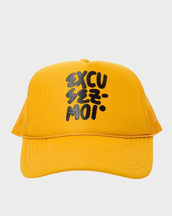 Yellow cap with black text on a white background