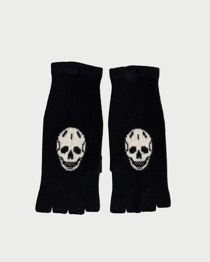 Black fingerless gloves with skull designs on a light gray background