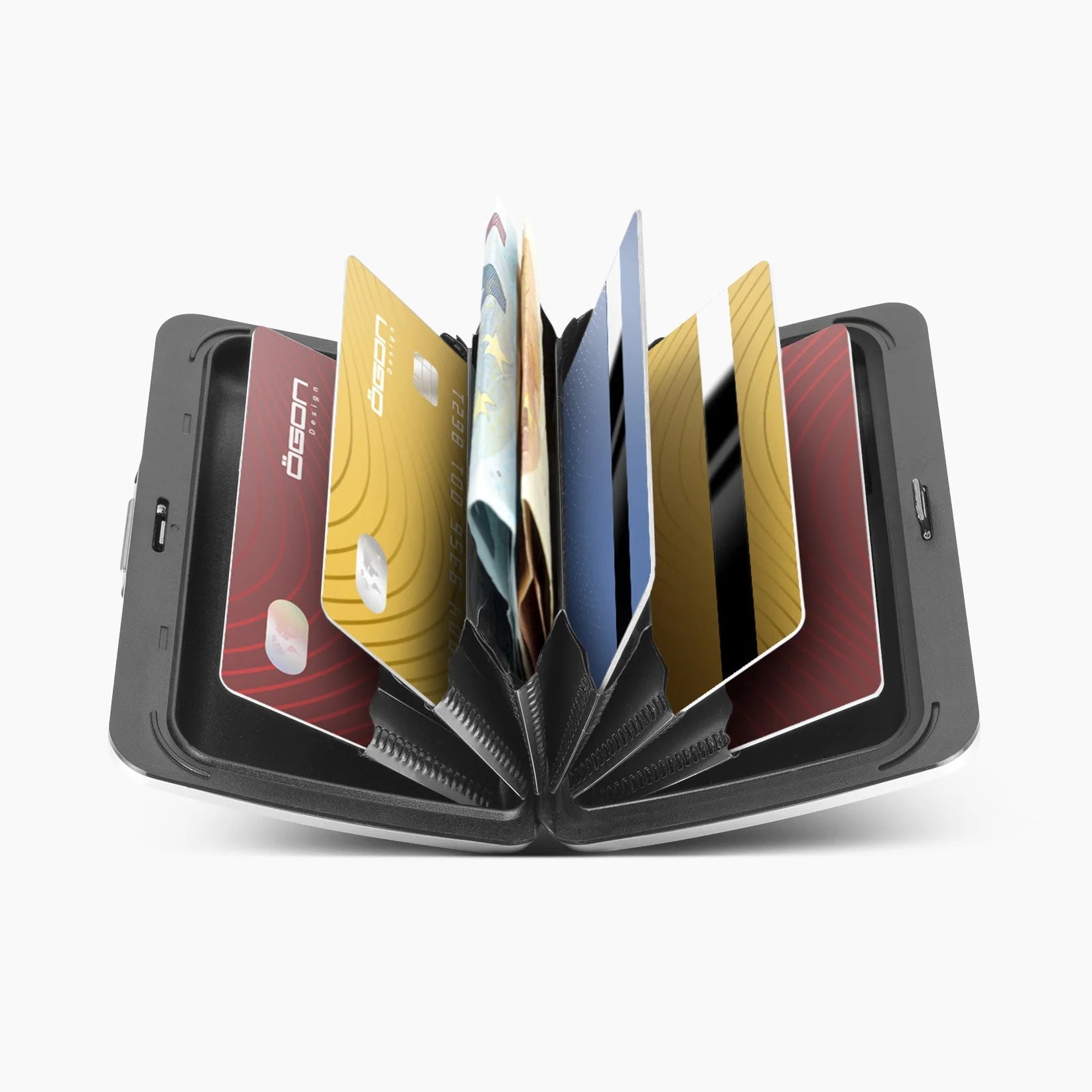 An OGON Design Oslo Aluminum Card Holder in black is open, revealing multiple credit cards and banknotes neatly arranged in RFID-protected accordion slots against a white background.