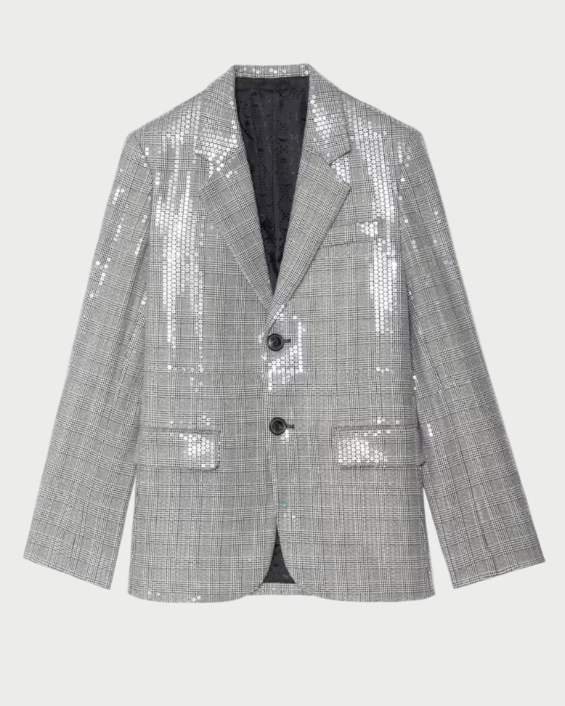 The Zadig & Voltaire Vanille Sequin Blazer features a silver Prince of Wales check, notched lapels, two black buttons, flap pockets, and subtle sequin embellishments, shown against a plain light background.