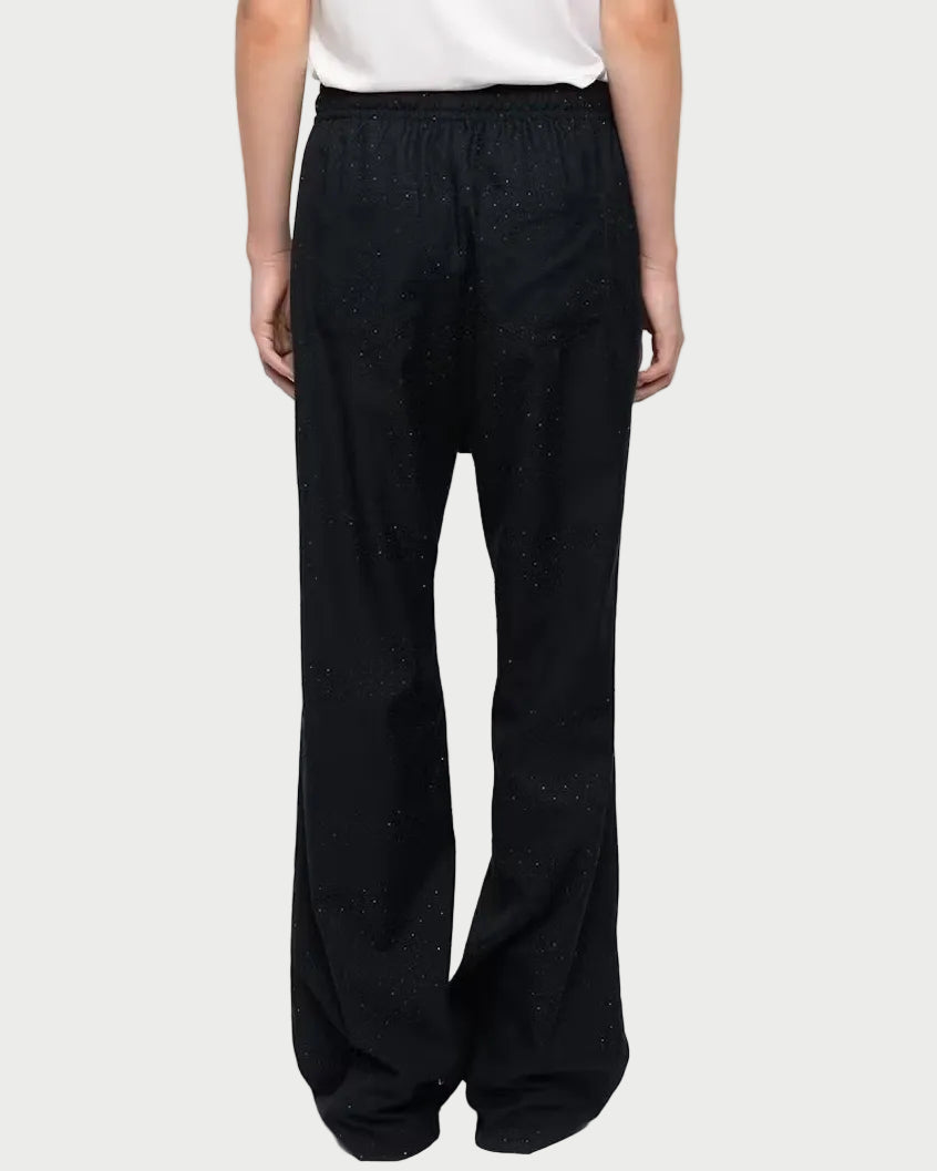 Back view of black Zadig & Voltaire Poma Pants, featuring a wide-leg fit with subtle shimmering rhinestone detailing throughout.