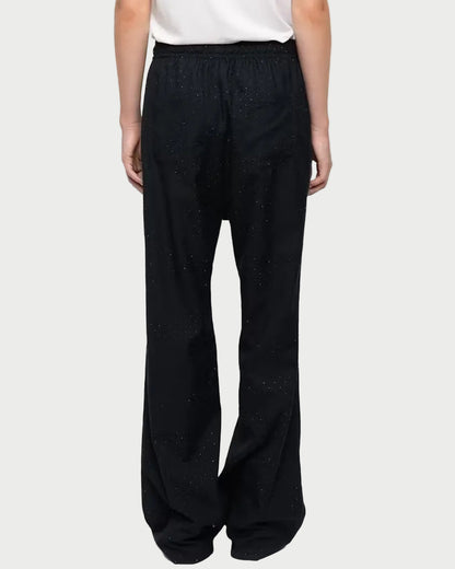 Back view of black Zadig & Voltaire Poma Pants, featuring a wide-leg fit with subtle shimmering rhinestone detailing throughout.