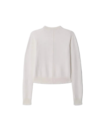 The RE/DONE Re/Done Mickey Mouse Classic Crewneck Sweatshirt, vintage-inspired with a boxy fit, is shown from the back in off-white. It features ribbed cuffs, hem, and neckline, with a subtle center seam running down the back.