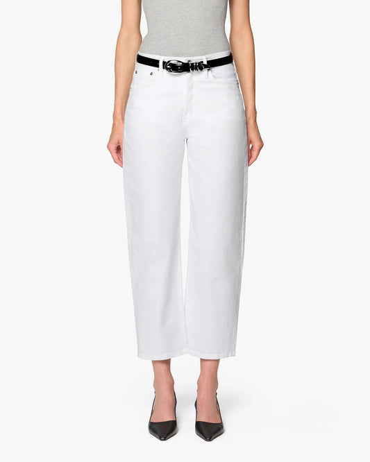 A person wears the Betro Simone Ellen Bow Leg Pant, styled with a black belt, gray sleeveless top, and black pointed-toe heels, standing against a plain white background.