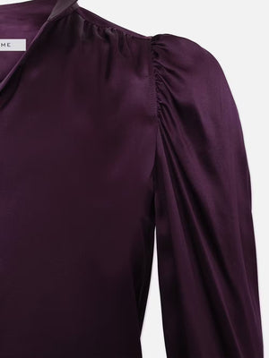 sleeve detail of Frame silk blouse in a rich plum color at west2westport.com