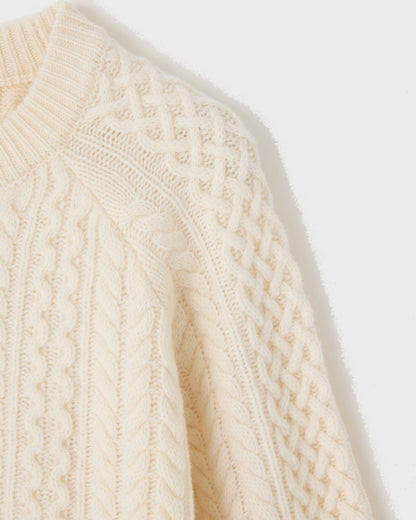 Cream-colored cable-knit Moussy Panel Cable Pullover.