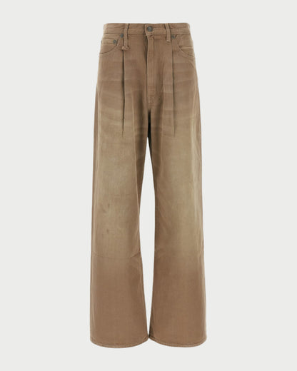 The Damon Pleated Jeans in Sawdust by R13 are wide-leg, high-waisted khaki denim pants with front pleats, side and back pockets, button-zipper closure, a slightly faded finish, and an oversized slouchy fit for relaxed comfort.