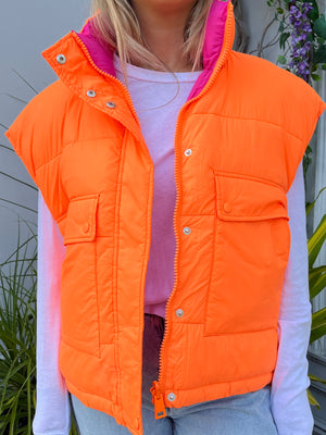 you will definitely be seen in this bright colored puffer vest at west2westport.com