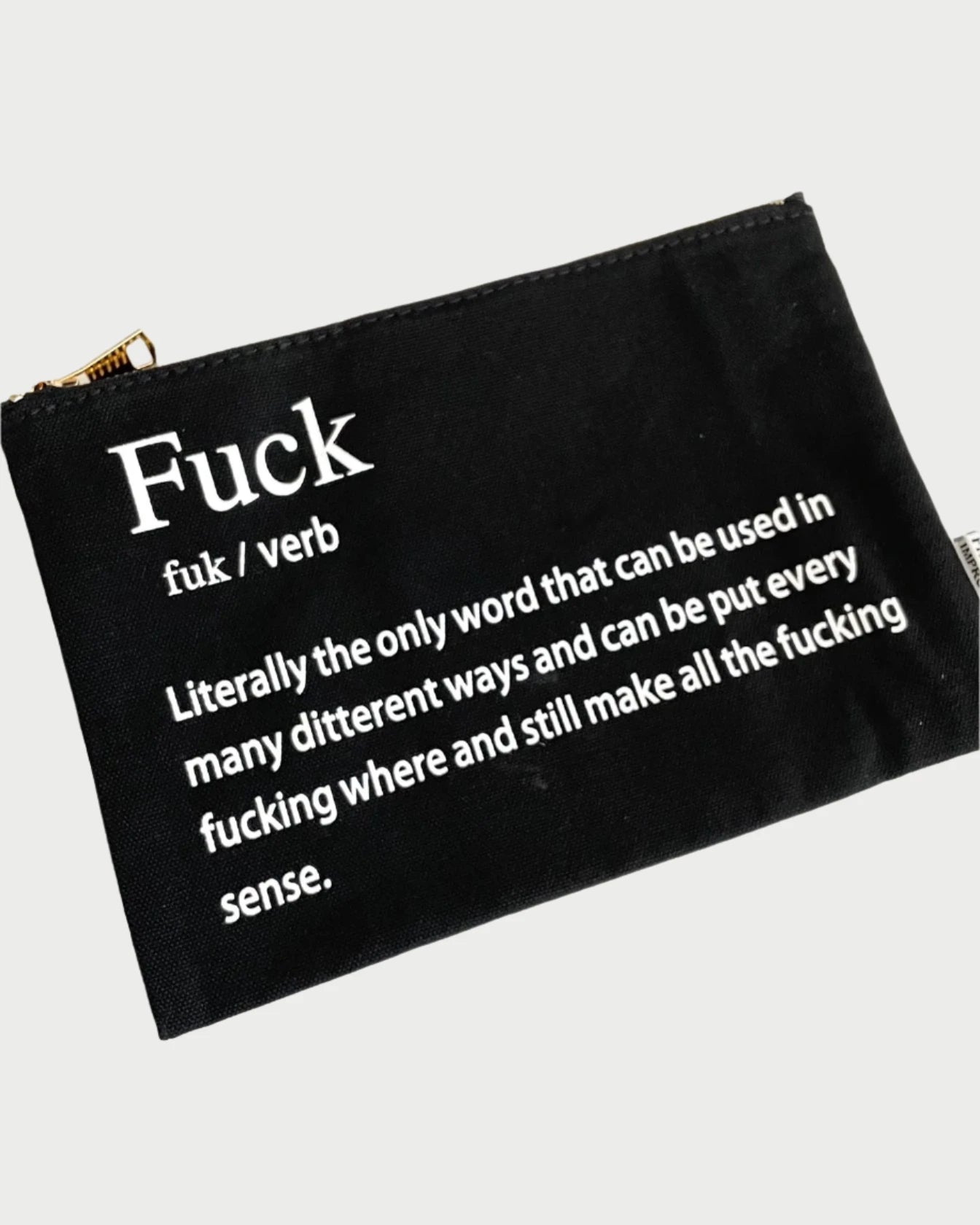 The Properly Improper "Improper Pouches" is a durable black zippered pouch that makes a sassy gift. It features a humorous definition in crisp white text, describing an expletive's adaptable role in any sentence with wit and practicality for everyday use.