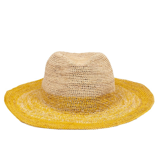 The Raffia Floppy Hat - yellow/natural by Travaux en Cours features a natural beige crown with a yellow-tinted brim, offering stylish summer sun protection and is shown against a white background.