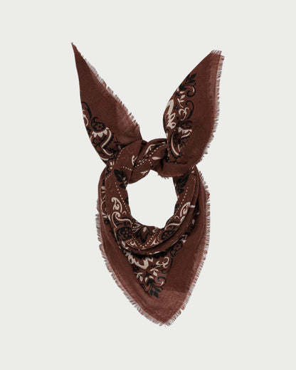 Brown bandana with intricate patterns on a white background