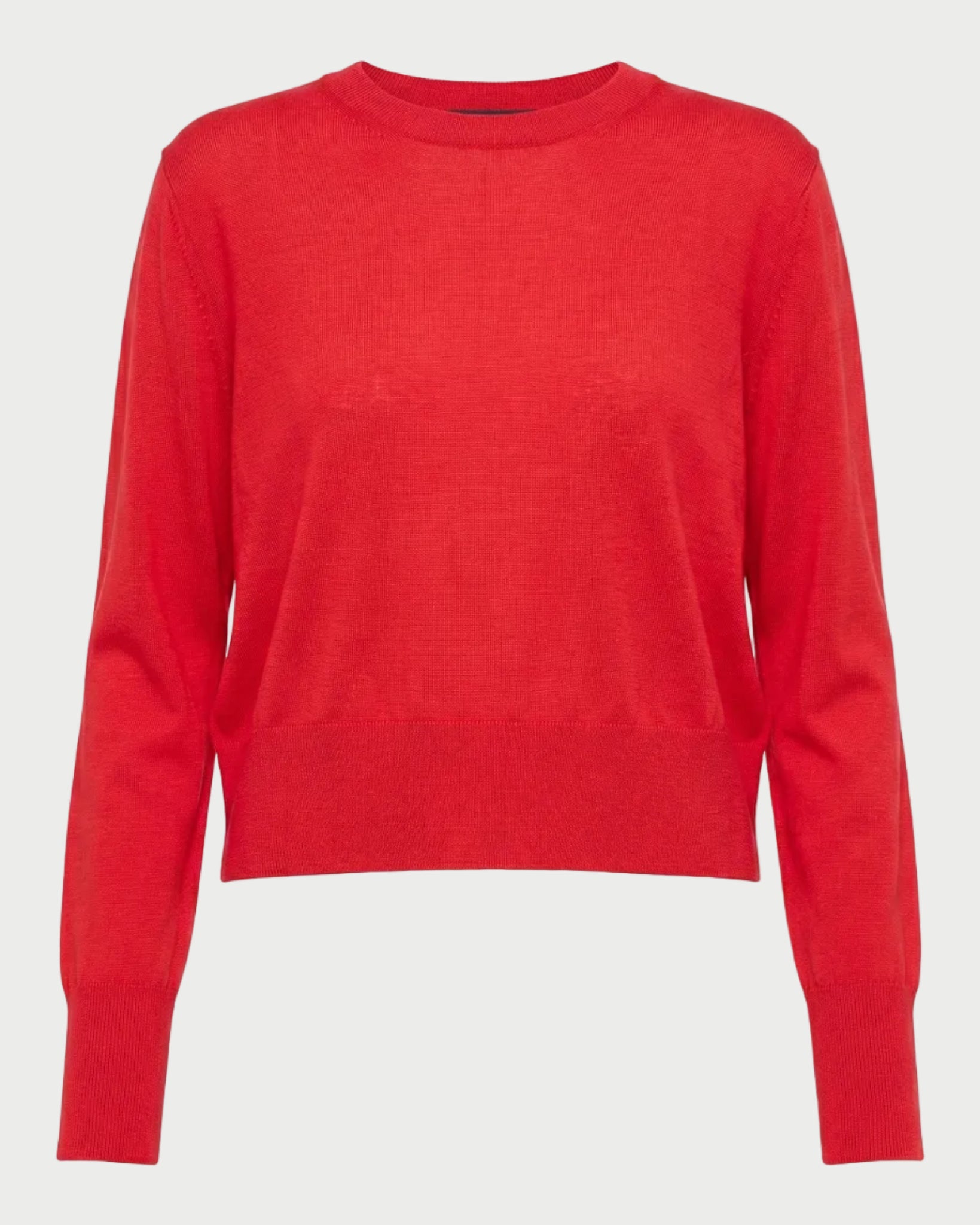 The Saint Art Elodie Sweater Tomato by Saint Art NY is a bright red, long-sleeve crew neck sweater with a relaxed fit and ribbed cuffs and hem, shown on a plain white background.