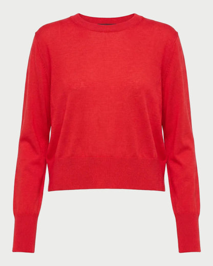 The Saint Art Elodie Sweater Tomato by Saint Art NY is a bright red, long-sleeve crew neck sweater with a relaxed fit and ribbed cuffs and hem, shown on a plain white background.