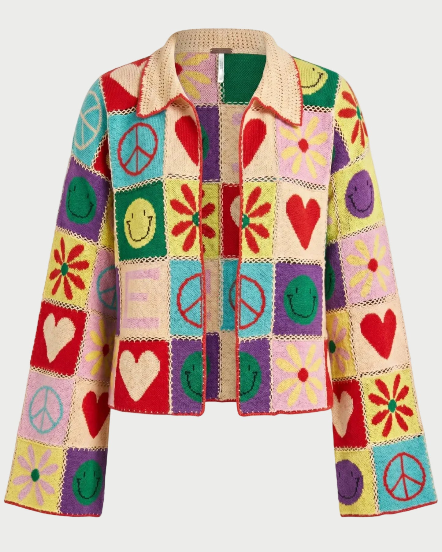 The ME369 Miami Crochet Cardigan by ME369 features vibrant granny-square patchwork with peace signs, smiley faces, hearts, and flowers in bold red, yellow, pink, green, blue, and purple for a fun retro-inspired look.