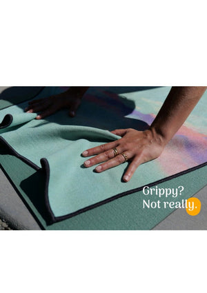 The problem with Yoga towels, available at west2westport.com