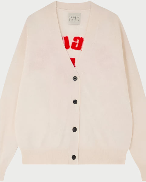 The Lifeguard Cardigan by JUMPER1234 features a deep V-neck, sleek black buttons, and an oatmeal hue. A red and white graphic pattern subtly peeks through underneath, while its cashmere elegance epitomizes luxury.