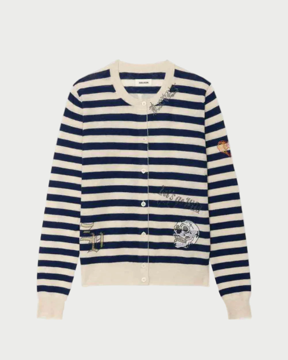 Navy and white striped cardigan with patches on a light gray background
