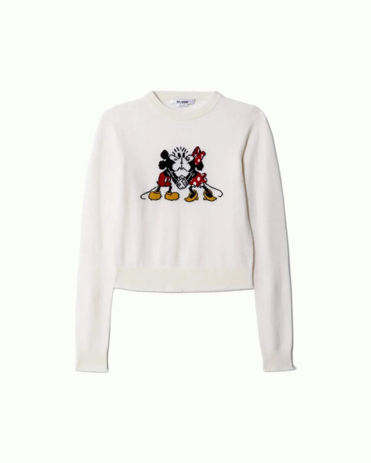 The RE/DONE Mickey and Minnie Cashmere Crewneck is a white sweater featuring an illustration of the iconic duo holding hands and facing each other on the front.