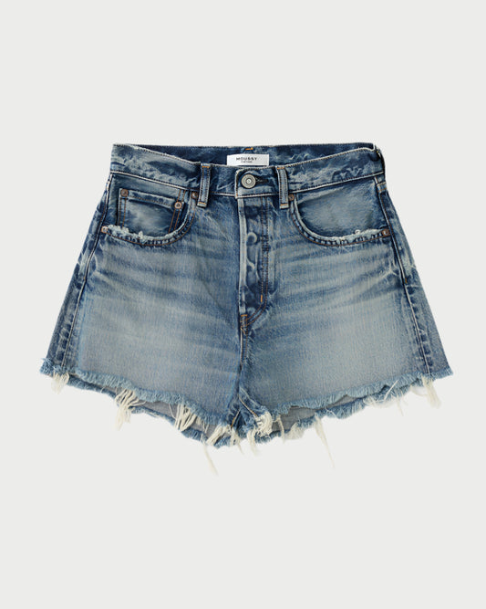 The Moussy Douglaston Denim Shorts feature a mid blue wash, frayed hems, front pockets, and a button fly closure, shown against a light background.