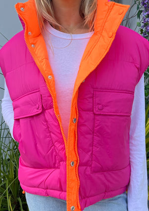 neon pink and orange reversible puffer vest by essentiel antwerp at west2westport.com