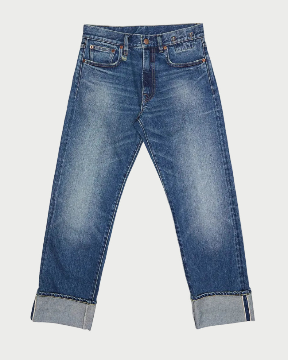 R13 Cuffed Romeo Caslon Selvedge Blue jeans by R13, featuring a faded blue wash, slim boyfriend fit, straight legs, and wide cuffed hems, are displayed flat on a white background.