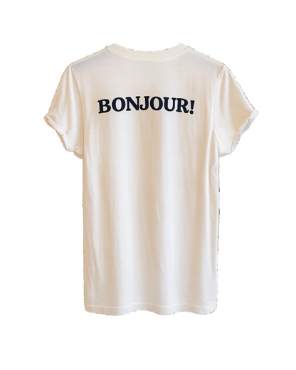 A white Recycled Karma Paris Is Always A Good Idea Tee by RECYCLED KARMA is displayed on a plain background. Made from 100% cotton, this vintage graphic tee features the phrase "Paris Is Always A Good Idea" printed in large black letters across the upper back of the shirt.
