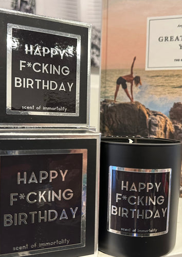 Happy F*cking Birthday candle and Taschen Great Escapes Yoga book at west2westport.com