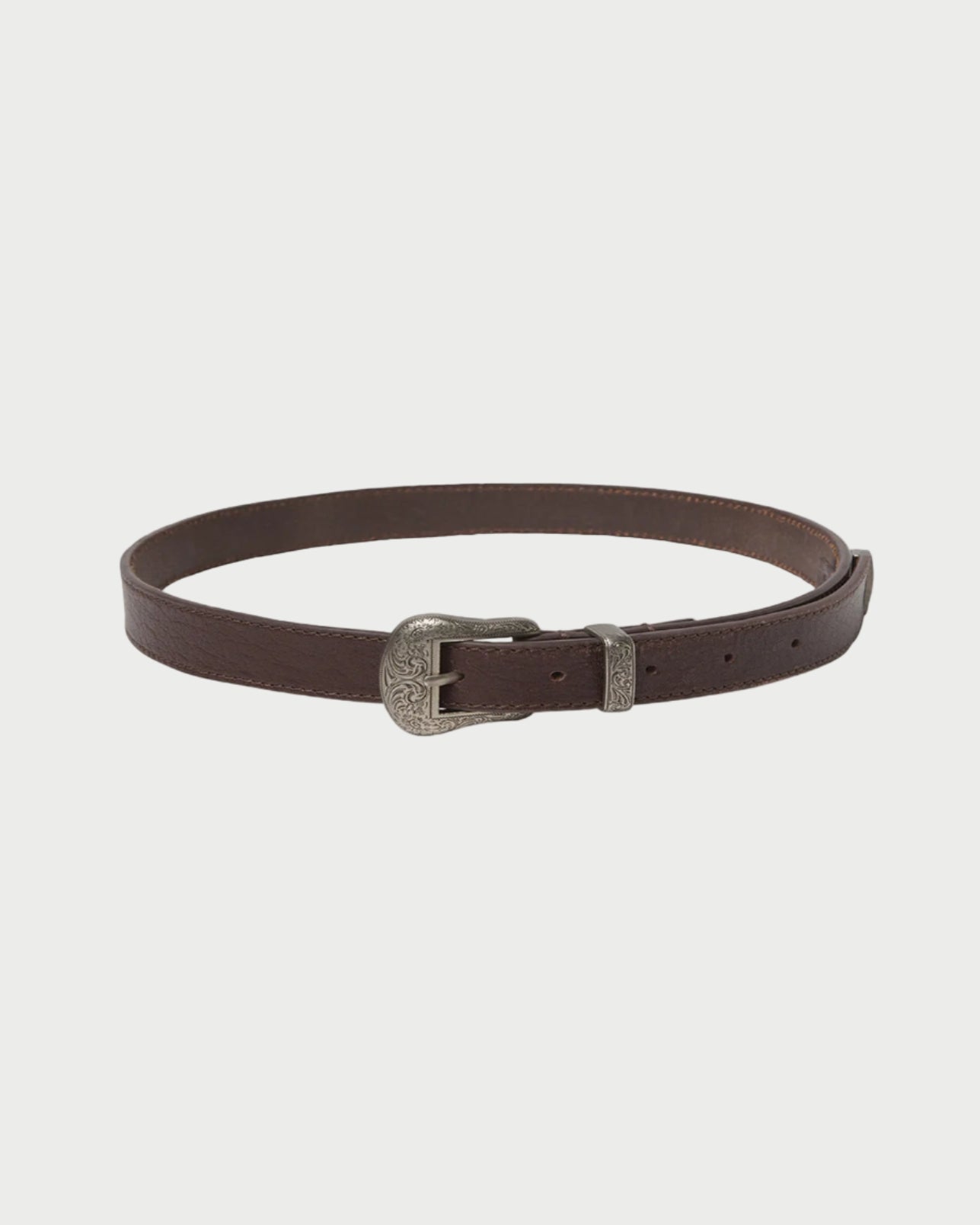 Brown belt with a silver buckle on a beige background