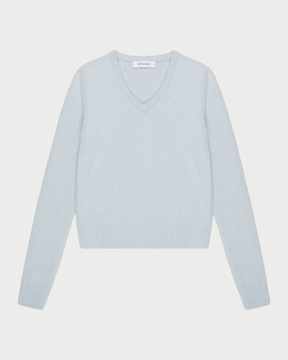 Light blue sweater on a white background