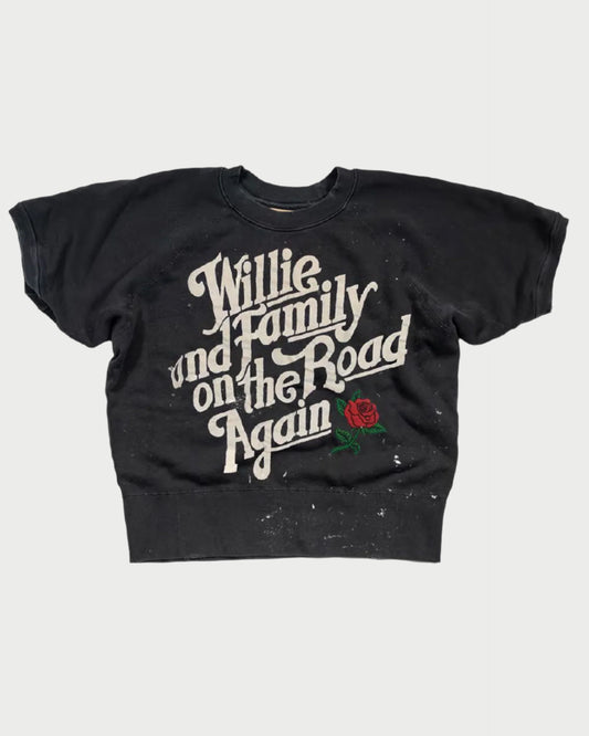 Black t-shirt with 'Willie Family on the Road Again' text and a rose graphic on a white background