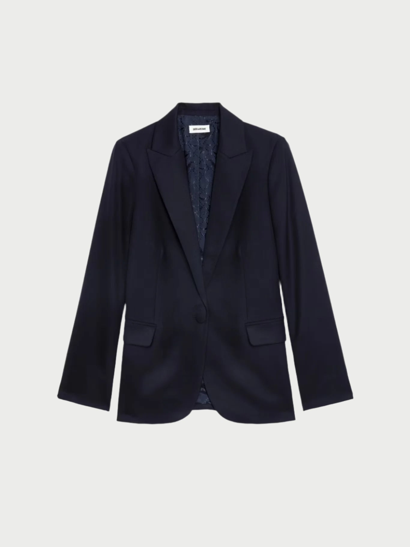 The Tailored Navy Blazer by Zadig & Voltaire features a sleek straight-cut design with a single button, long sleeves, and two front pockets. Its grain wool sophistication is enhanced by the visible lining, elegantly showcased against a plain white background.