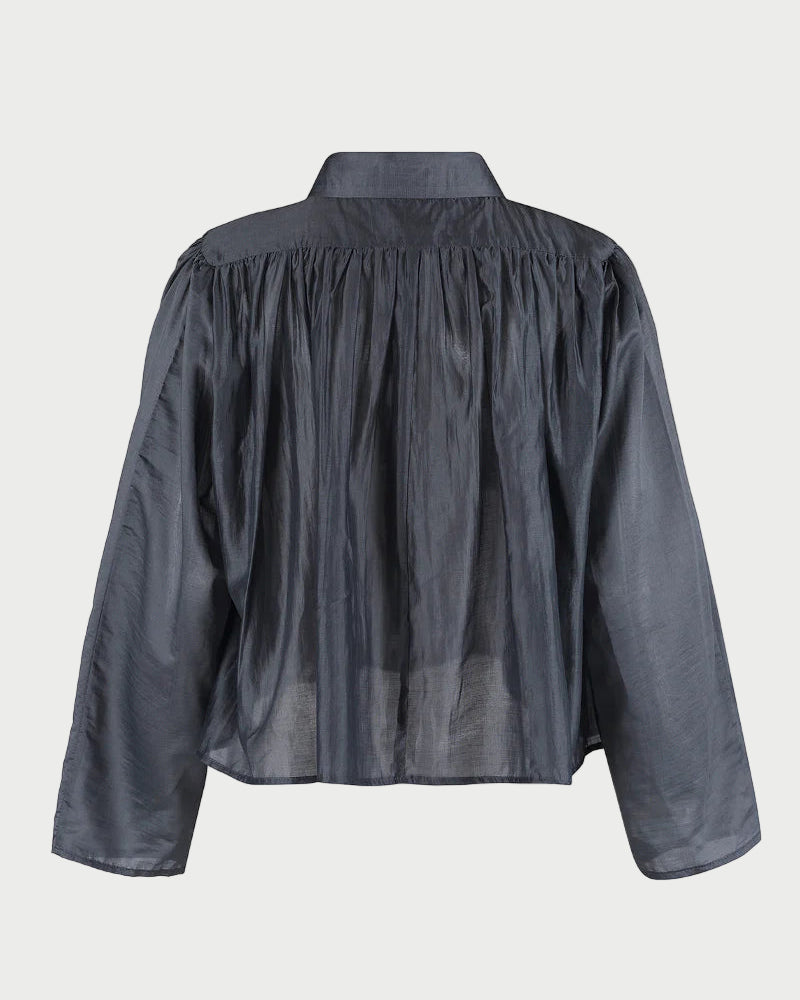 Dark gray blouse with long sleeves on a white background