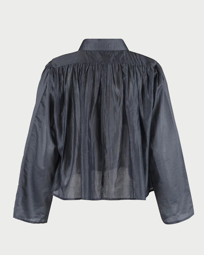 Dark gray blouse with long sleeves on a white background