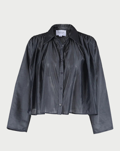 Black sheer blouse with long sleeves on a white background