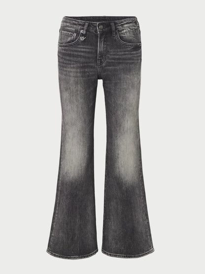 Black flared jeans on a white background