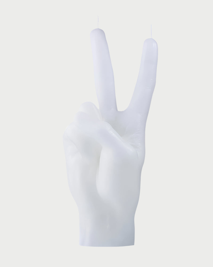 A life-sized, handmade Candle Hand Victory "Peace" by 54° Celsius, shaped like a hand making a peace sign, with two wicks on top of the extended fingers, set against a plain white background—perfect for adding unique charm to your Spring decor.
